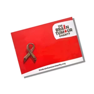 ribbon occasion favour pin badge on red card