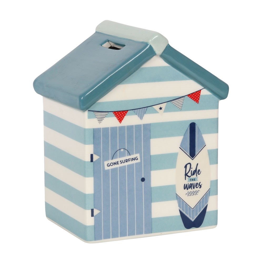 Beach hut shaped ceramic money box on white background